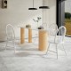 Vintage Windsor wood dining chairs in white with spindle back design, offering comfort and durability for dining rooms.